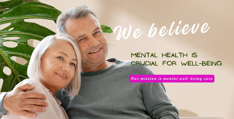 A smiling older couple sits closely together on a couch. Text reads: "We believe mental health and wellbeing are crucial for overall wellness. Our mission is mental well-being care.